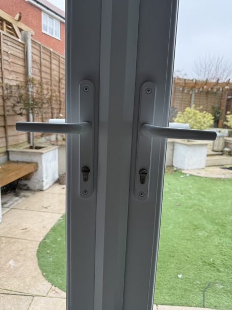 Keyed-Alike Security Upgrade Matching keyed-alike security cylinders fitted to French doors in Acton